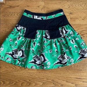 Green and black mini skirt